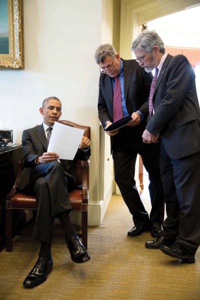 Photograph depicting John Holdren, science adviser to President Barack Obama and co-chair of the President's Council of Advisors on Science and Technology (PCAST), and Eric Lander, PCAST co-chair, speaking with President Obama in the outer Oval Office. Source: National Archives Catalogue